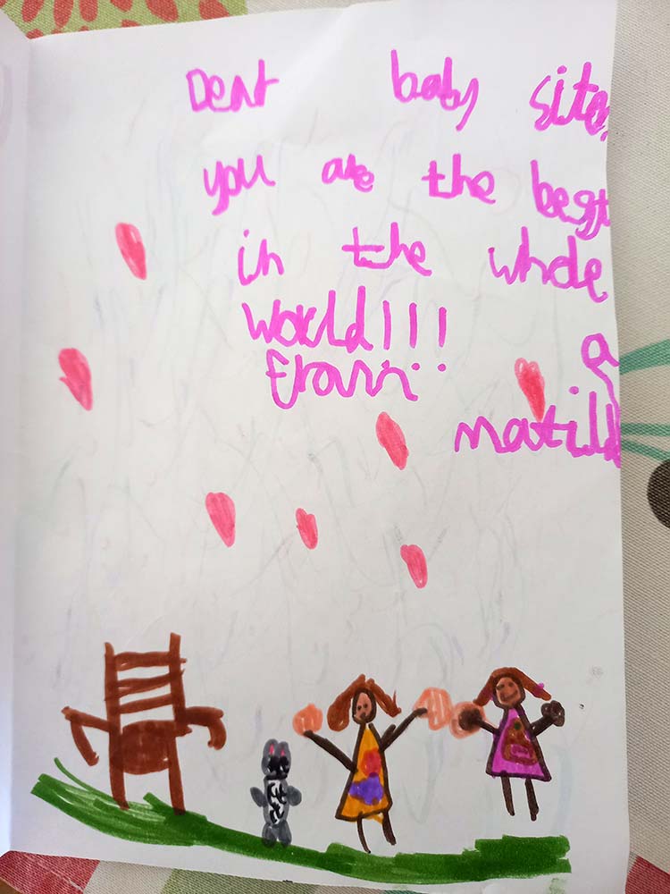 Child’s handwritten thank-you note with colorful drawings for their babysitter in Sifnos